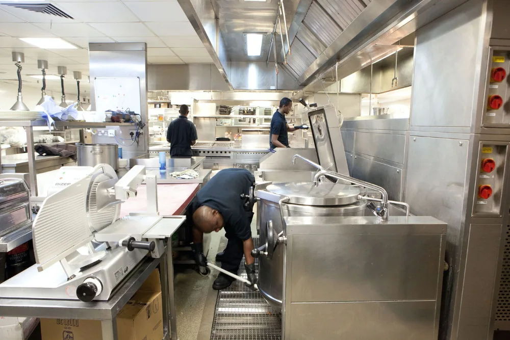 Cleaning Chief professional performing breakroom and kitchenette degreasing in NYC
