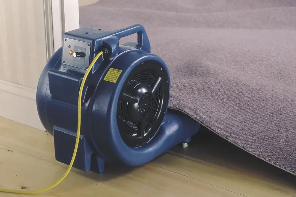 Cleaning Chief professional performing commercial air mover deployment in NYC