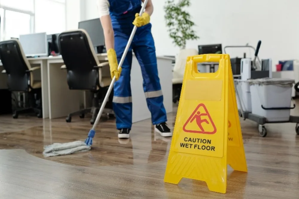 Cleaning Chief professional performing floor vacuuming and mopping in NYC