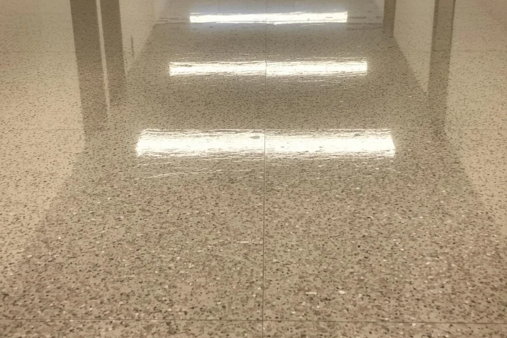 Cleaning Chief professional performing high-gloss finish application in NYC