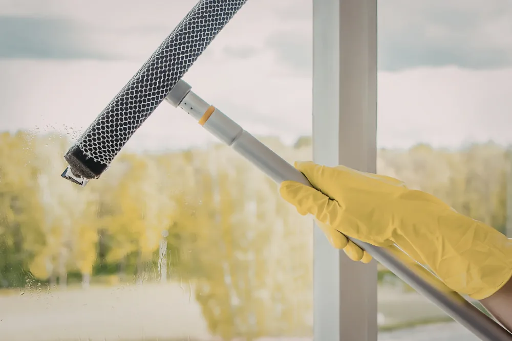 Cleaning Chief professional performing interior window & frame cleaning in NYC