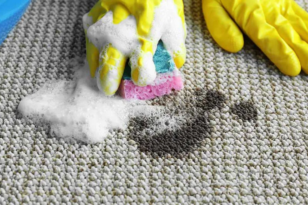Cleaning Chief professional performing petroleum and grease stain removal in NYC