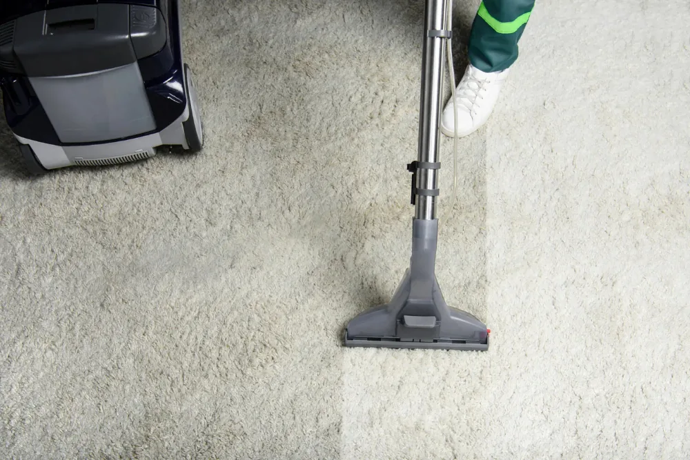 Cleaning Chief professional performing post-construction carpet reset in NYC