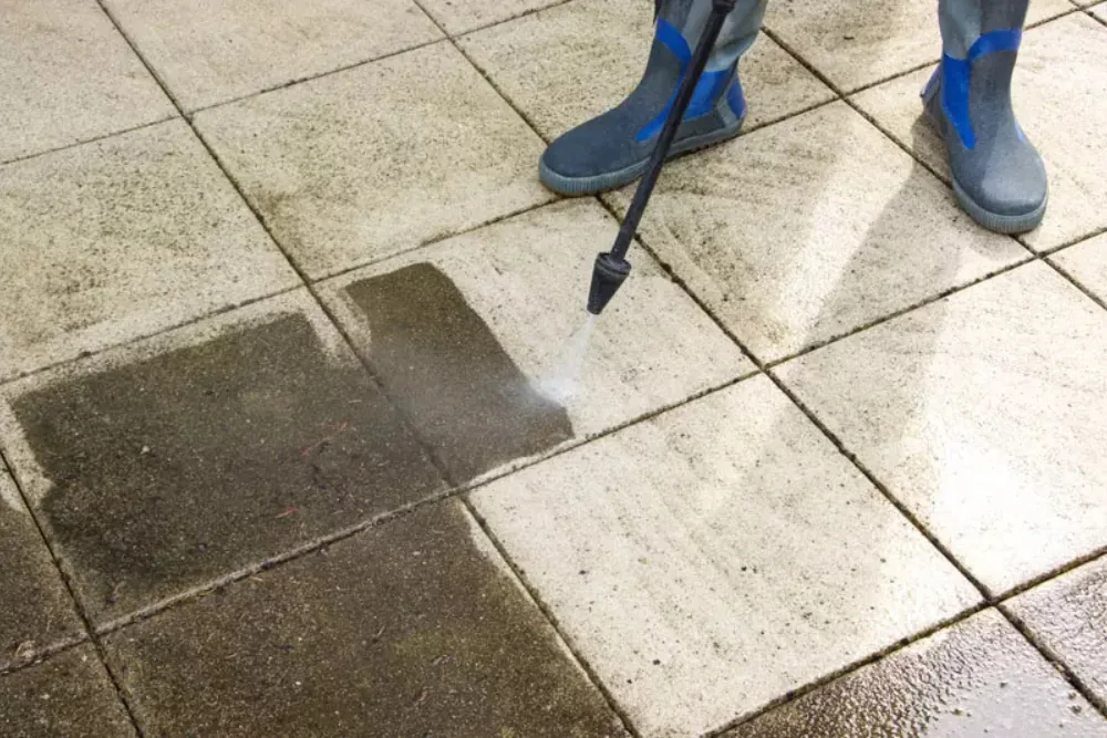 Cleaning Chief professional performing public restroom power washing in NYC