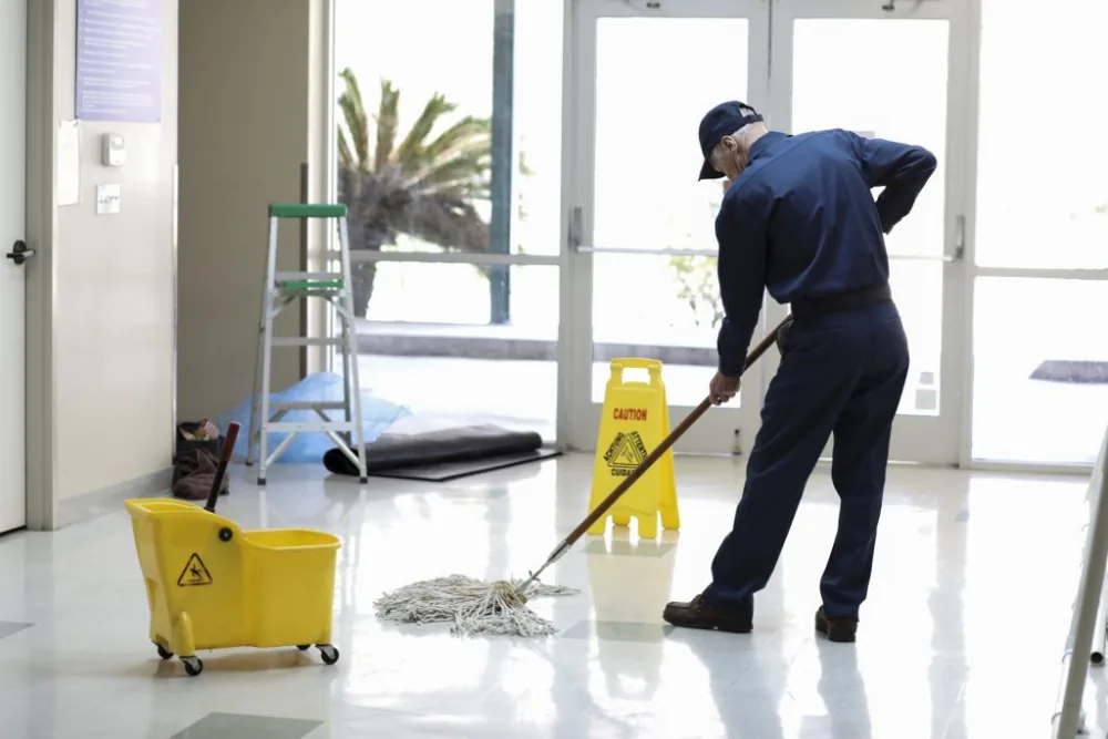 Cleaning Chief professional performing reception and lobby detailing in NYC