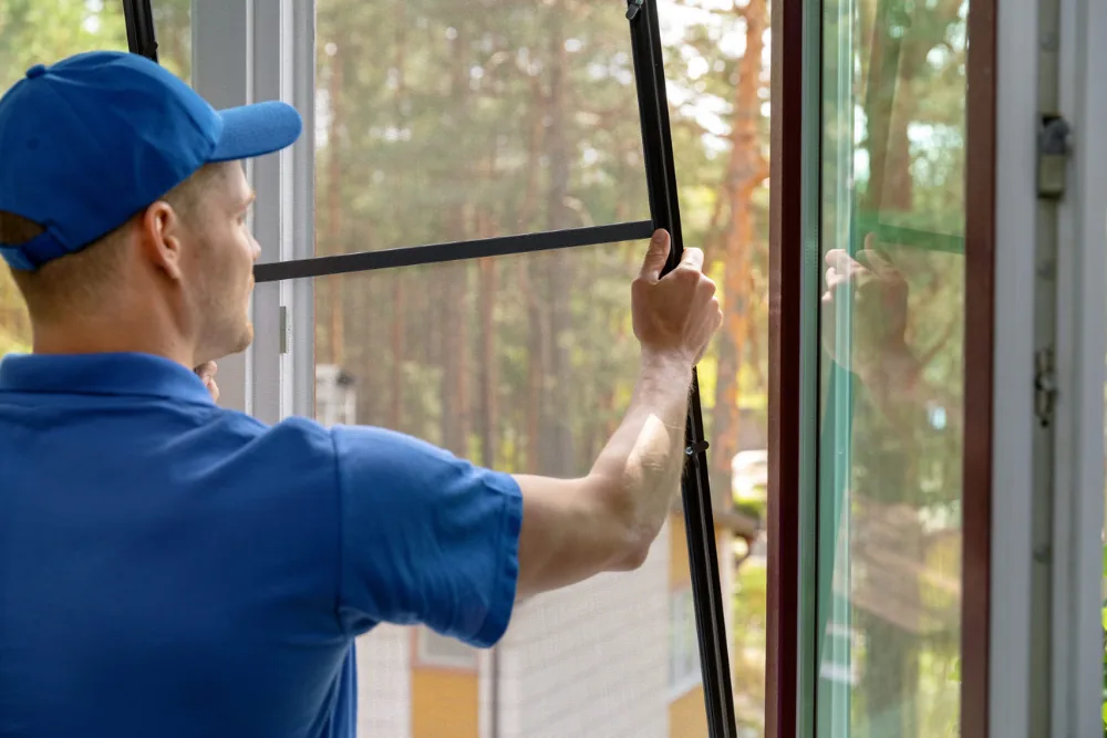 Cleaning Chief professional performing screen cleaning and removal in NYC