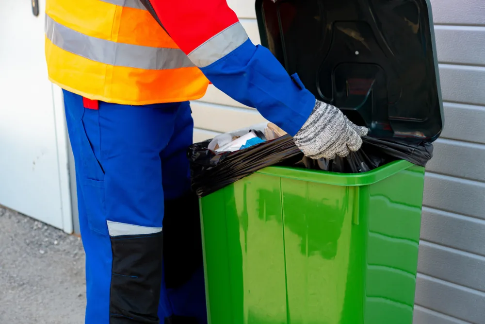 Cleaning Chief professional performing trash and recycling management in NYC