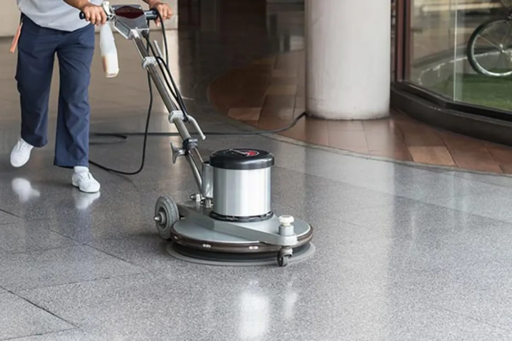 Cleaning Chief professional performing vct strip and wax in NYC